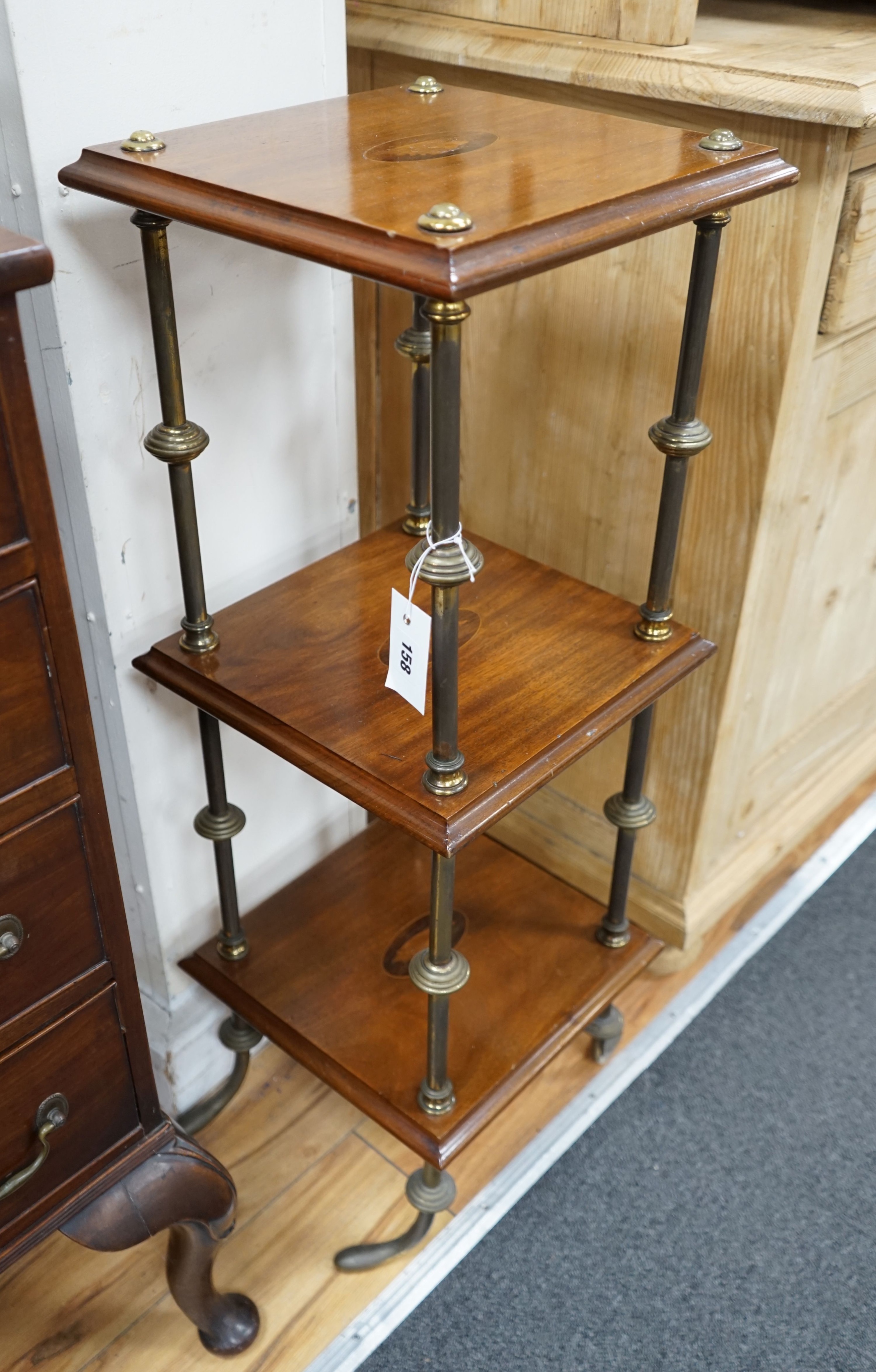 An Edwardian style brass mounted inlaid mahogany three tier whatnot, width 32cm, depth 31cm, height 89cm